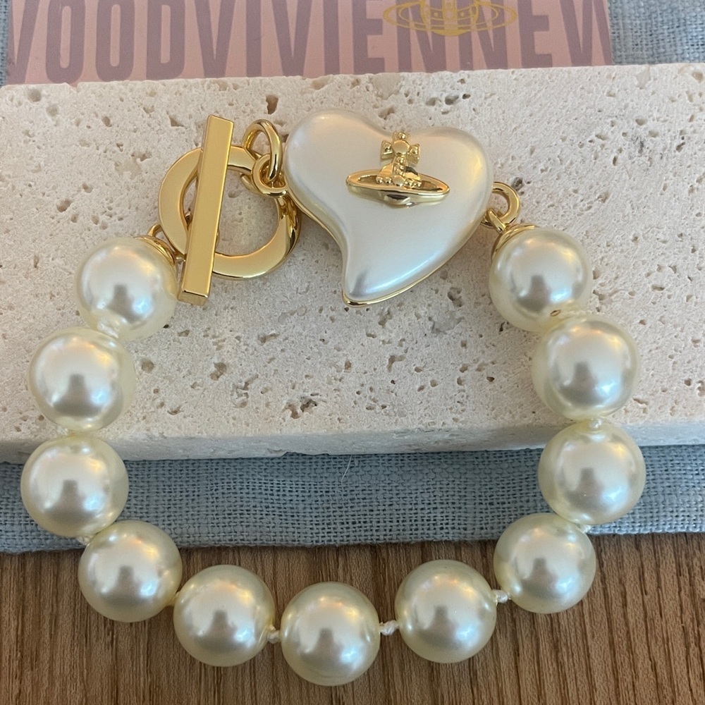 Vivienne Westwood Pearl Bracelet Orb Heart Charm Gold Tone Designer Jewelry